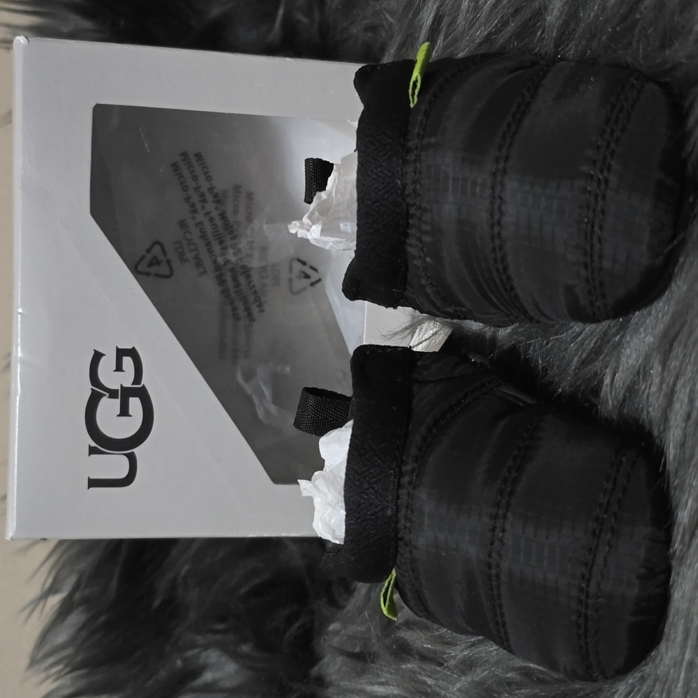 Size 0/1 Baby Black Tasman